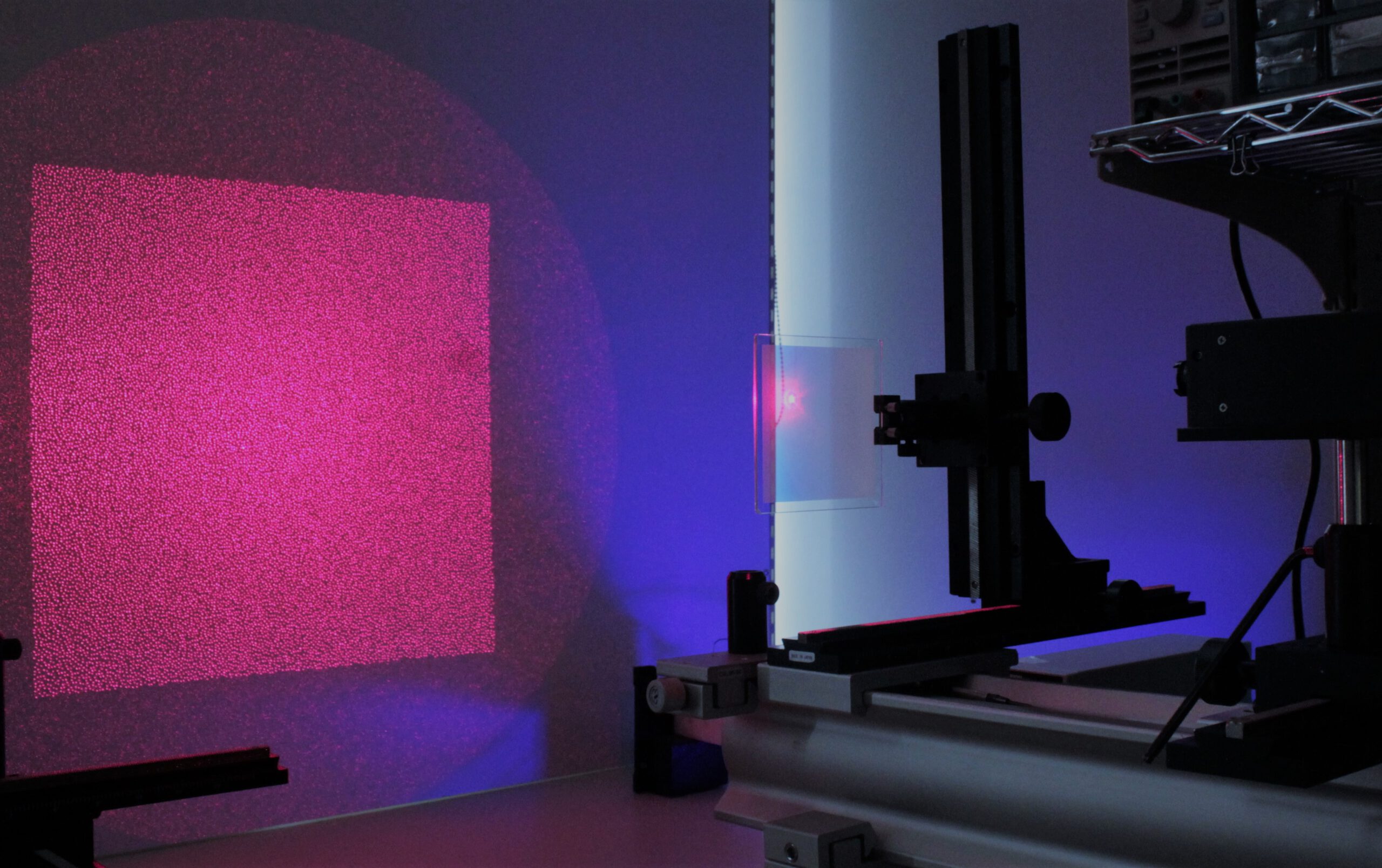 Laser beam through an in-house designed diffractive optical grating for Random Pattern Projection