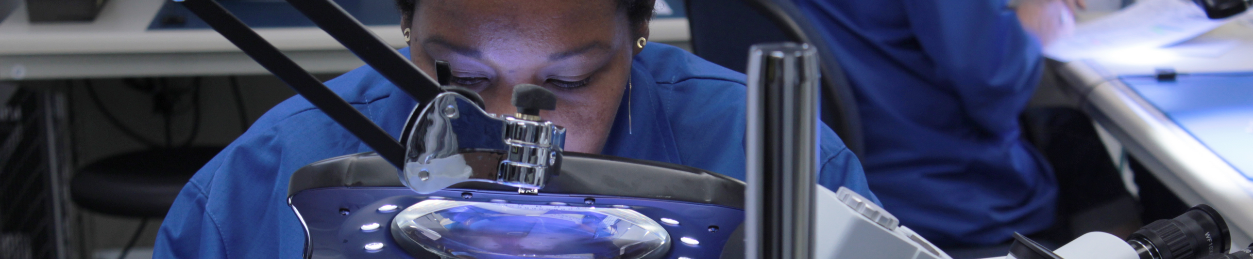 Osela employee working on Lasers for Machine vision and Bioinstrumentation